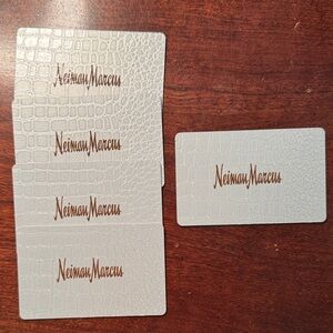 $250 in Neiman Marcus Gift Cards. 5 x $50 gift cards. $250.00 total value.